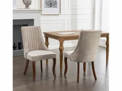Hauss Spole Conjunto de 2 sillas con patas de madera curvadas y respaldo alto.