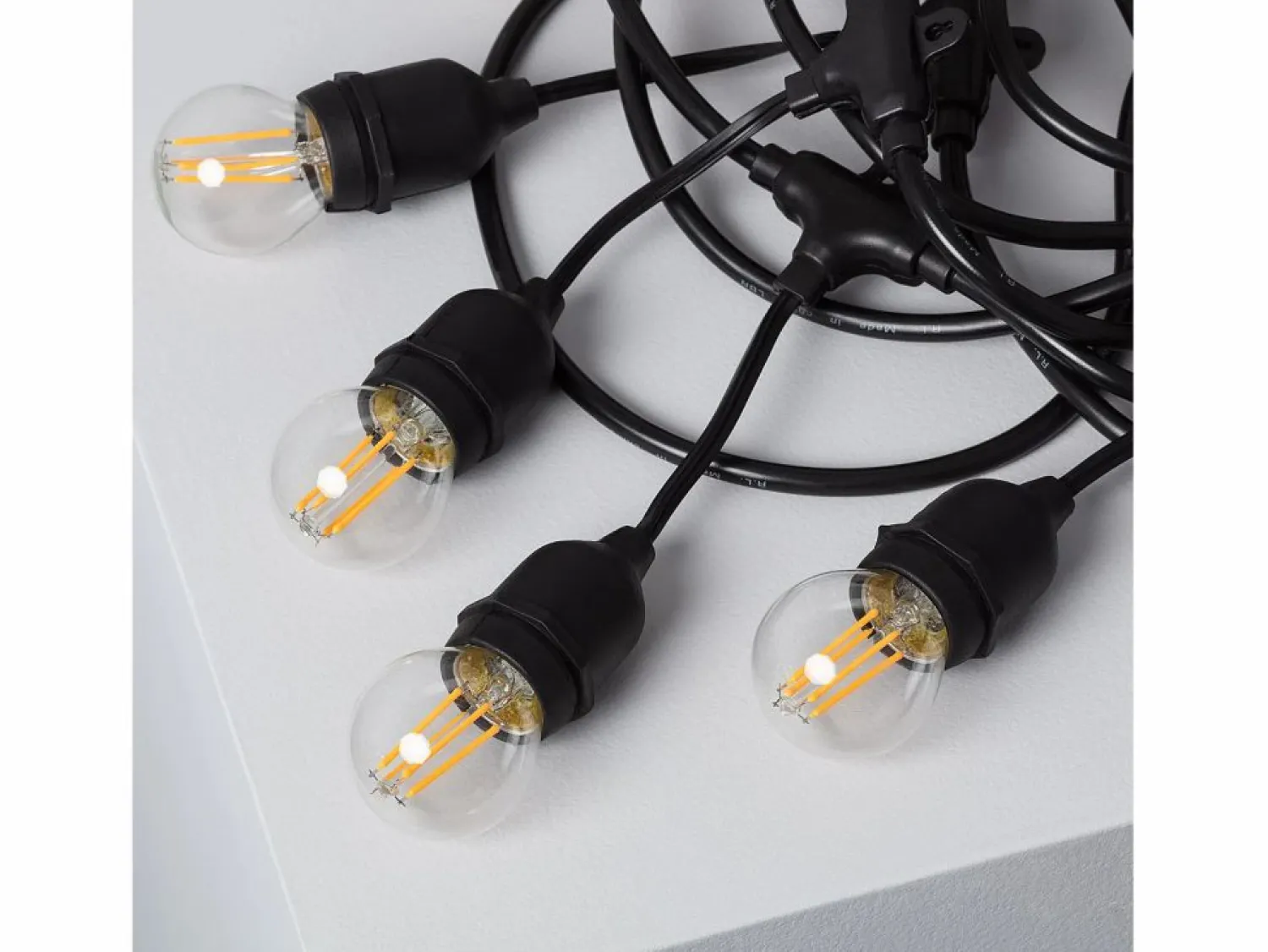 Ledkia Guirnalda Exterior con Bombillas LED E27 Filamento 5.5m IP65 Negro 2700K Cálido